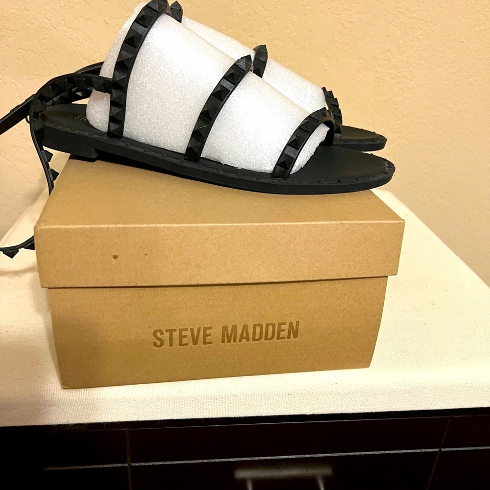 Steve Madden black gladiator sandals.